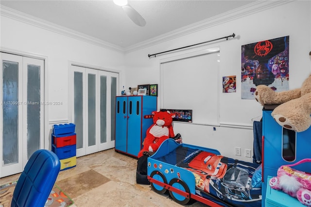 bedroom with a textured ceiling, a closet, ceiling fan, and ornamental molding