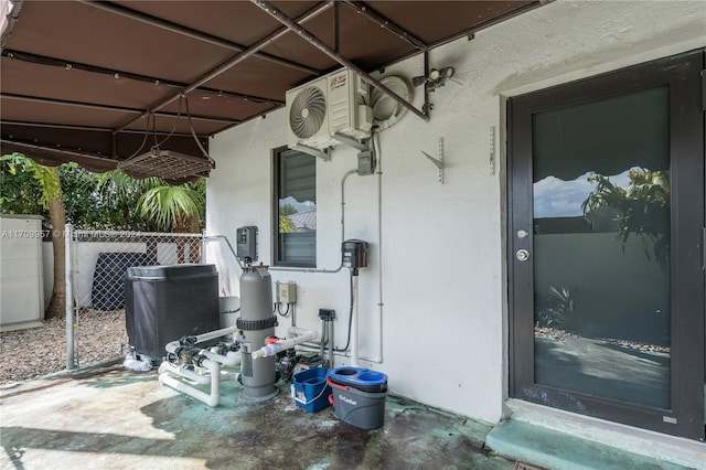 view of patio featuring ac unit