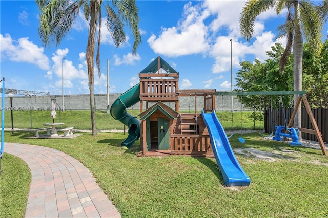 view of play area featuring a lawn