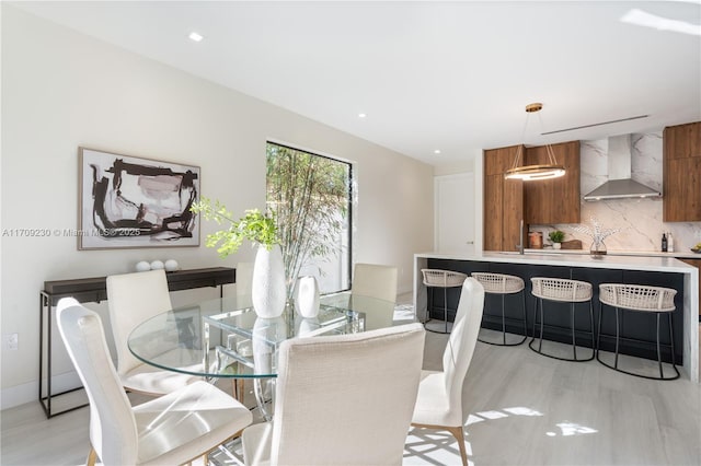 dining room featuring light wood-type flooring