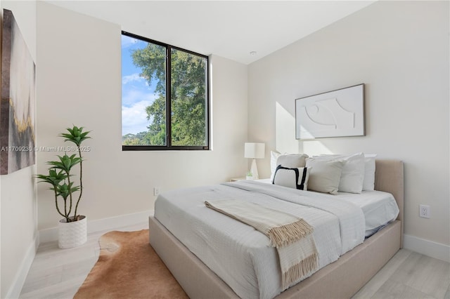 bedroom featuring light hardwood / wood-style flooring