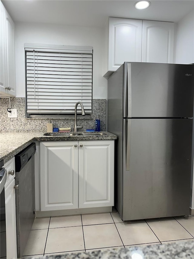 kitchen featuring white cabinets and stainless steel appliances