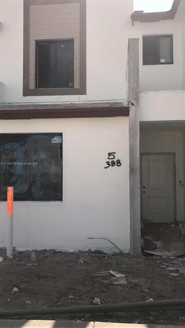 388 NE 208th Ter Unit 388, Miami, FL 33179 - exterior view of stucco siding