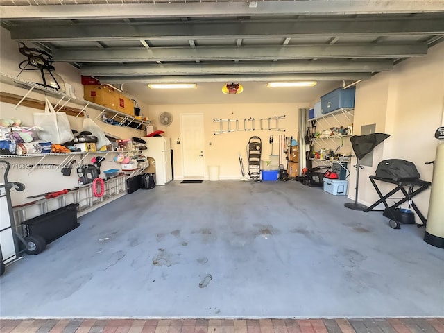 garage featuring white refrigerator