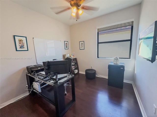 office with ceiling fan and dark hardwood / wood-style flooring