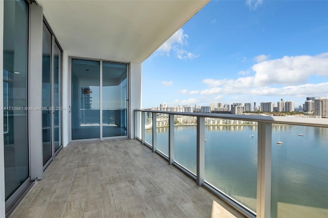 balcony featuring a water view