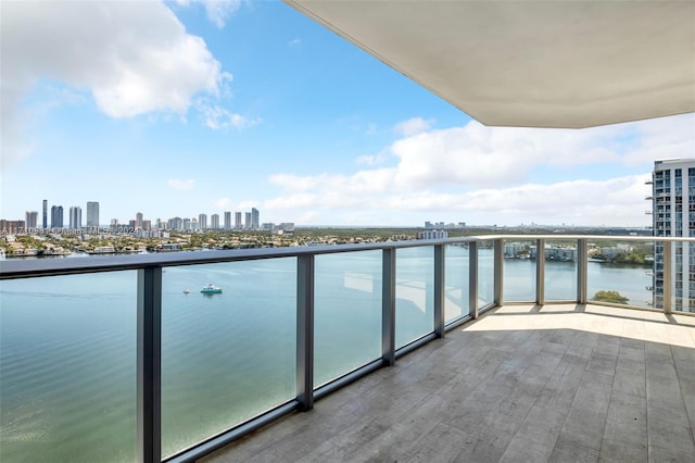 balcony featuring a water view