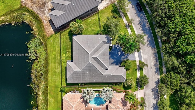 drone / aerial view with a water view