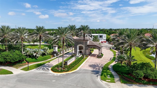 view of home's community featuring driveway