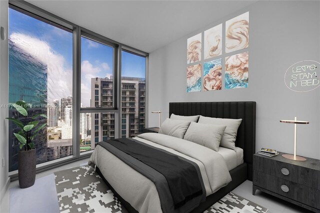 bedroom featuring expansive windows