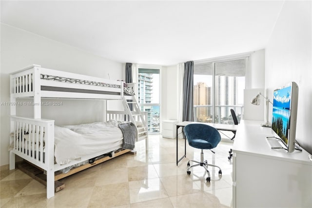 bedroom featuring light tile patterned floors