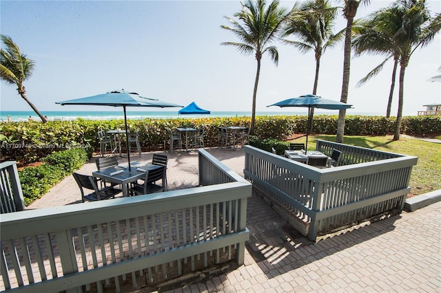 view of patio featuring a water view