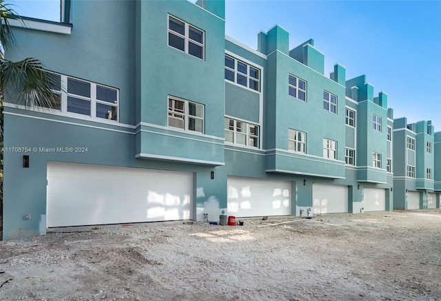 view of property with a garage