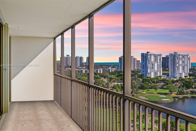 balcony at dusk with a water view