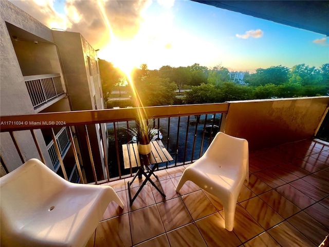 view of balcony at dusk