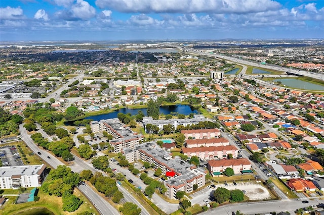 drone / aerial view with a water view