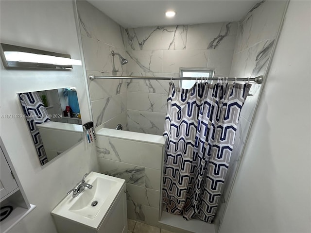 bathroom with a shower with curtain and vanity