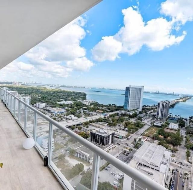 balcony featuring a water view