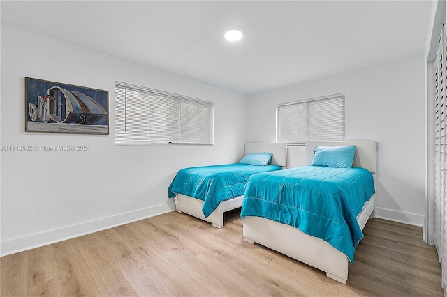 bedroom with wood-type flooring