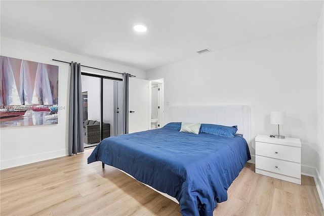 bedroom featuring light wood-type flooring