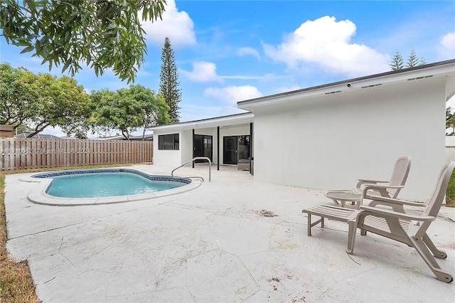 view of pool with a patio