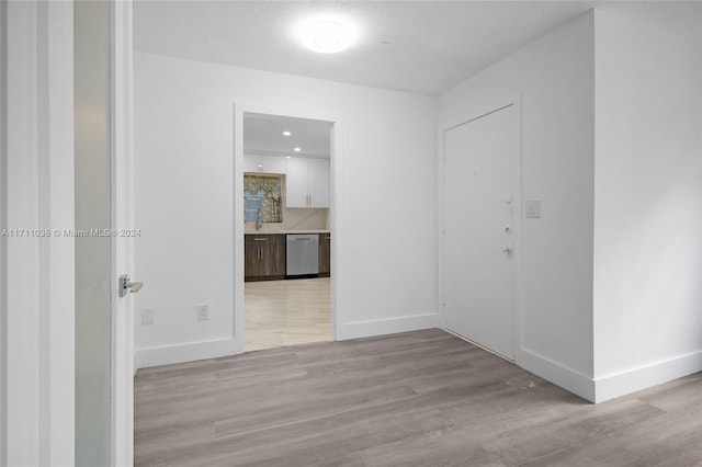 corridor featuring light hardwood / wood-style flooring