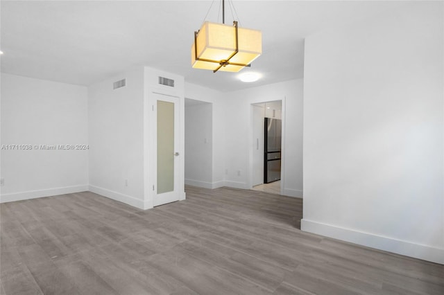 empty room featuring light hardwood / wood-style flooring