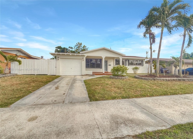 ranch-style house with a front yard and a garage