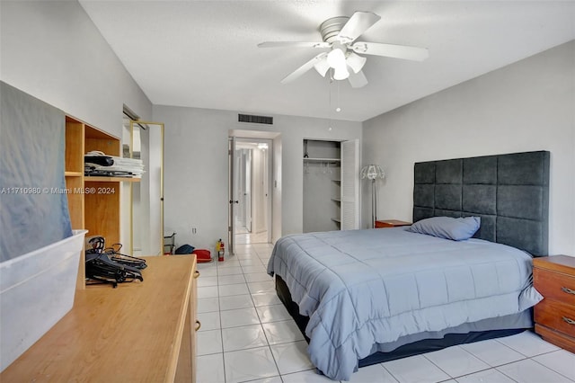 bedroom featuring light tile patterned floors and ceiling fan