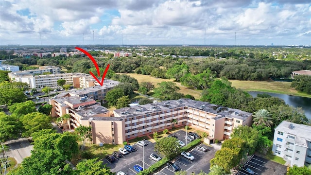 birds eye view of property featuring a water view