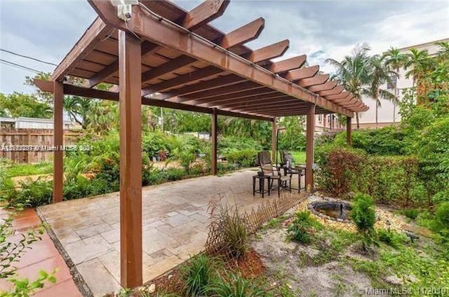 view of patio / terrace featuring a pergola