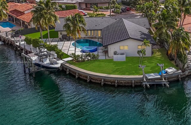 bird's eye view with a water view