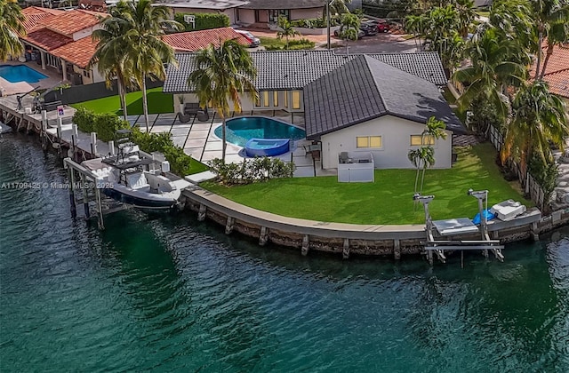 bird's eye view with a water view