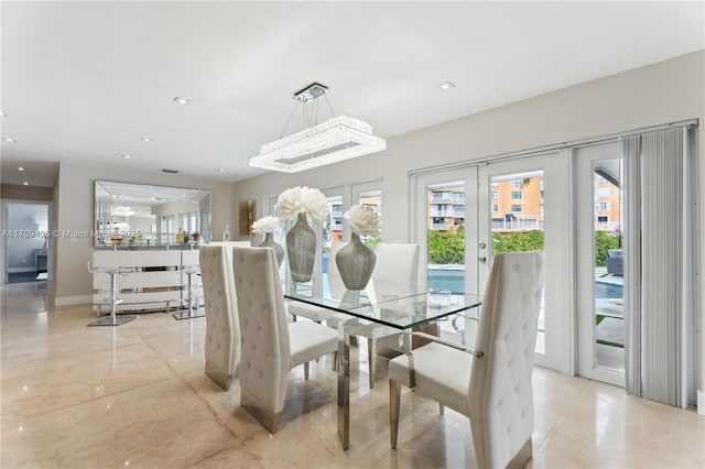 dining space featuring french doors