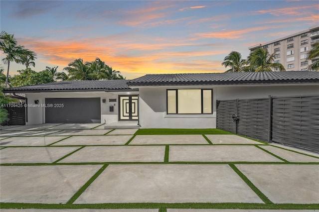 view of front of home featuring a garage