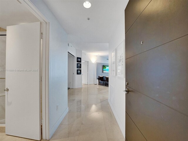 17301 Biscayne Blvd Unit 2008, North Miami Beach, FL 33160 - corridor featuring light tile patterned floors