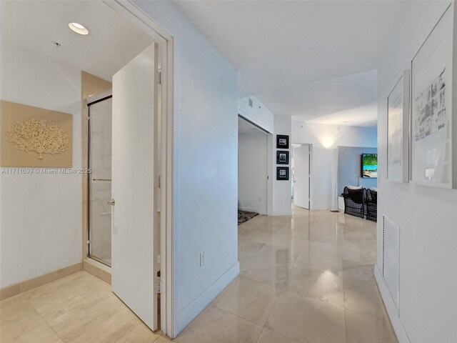 17301 Biscayne Blvd Unit 2008, North Miami Beach, FL 33160 - hall featuring baseboards and visible vents