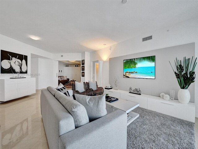 living room featuring expansive windows