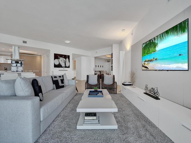 living room featuring carpet floors