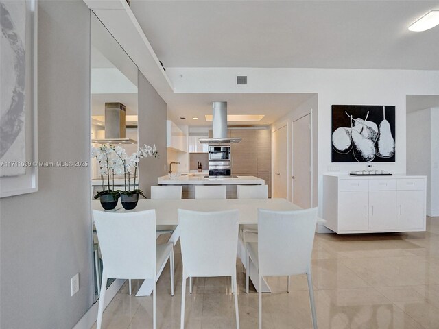 living room with light tile patterned floors