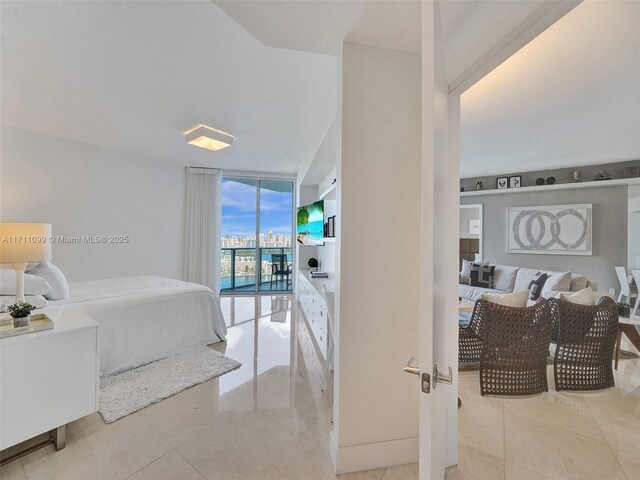 17301 Biscayne Blvd Unit 2008, North Miami Beach, FL 33160 - bedroom featuring expansive windows, access to exterior, and tile patterned floors