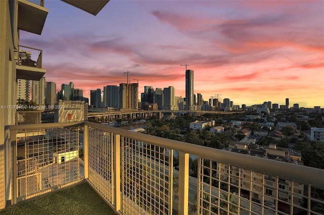 view of balcony at dusk