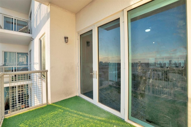 balcony featuring french doors