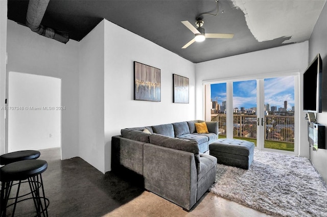 living room featuring ceiling fan