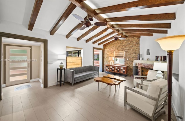 living room with lofted ceiling with beams and wood-type flooring