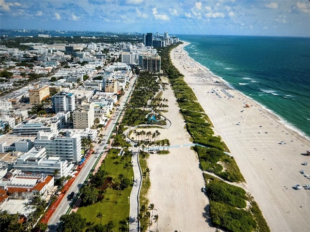 bird's eye view with a view of the beach and a water view