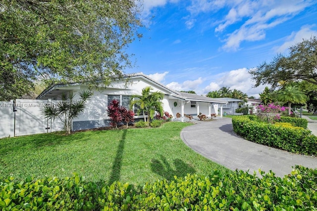 view of front of house with a front lawn