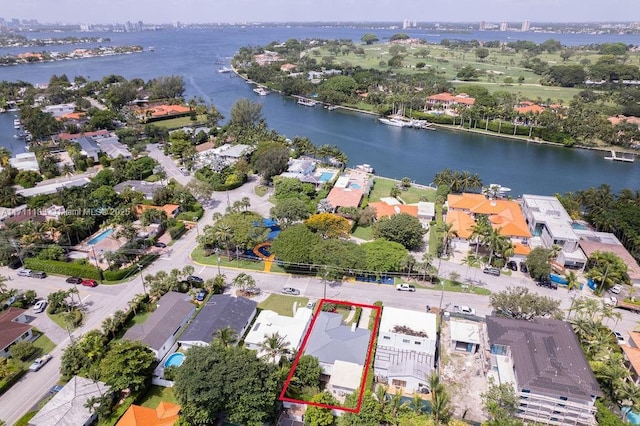 birds eye view of property featuring a water view