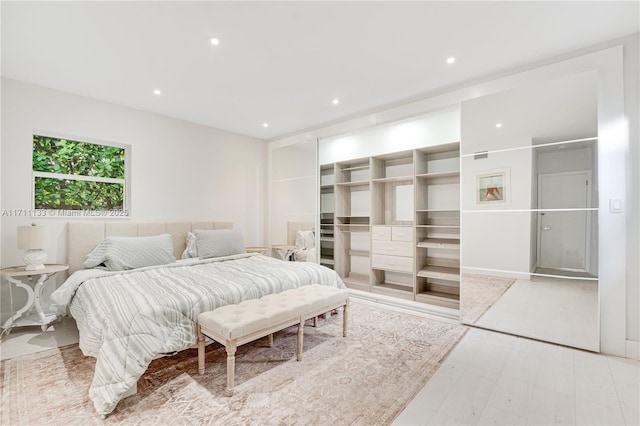 bedroom featuring recessed lighting