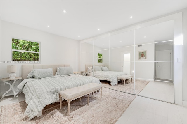 bedroom with recessed lighting